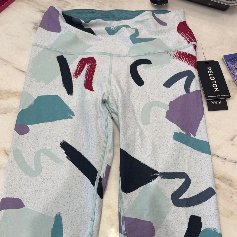 Peloton Light Gray Leggings with Teal, Purple & Burgundy Abstract Print